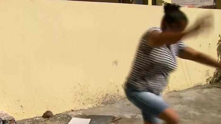 Rato assusta moradora ao vivo em jornal da Globo