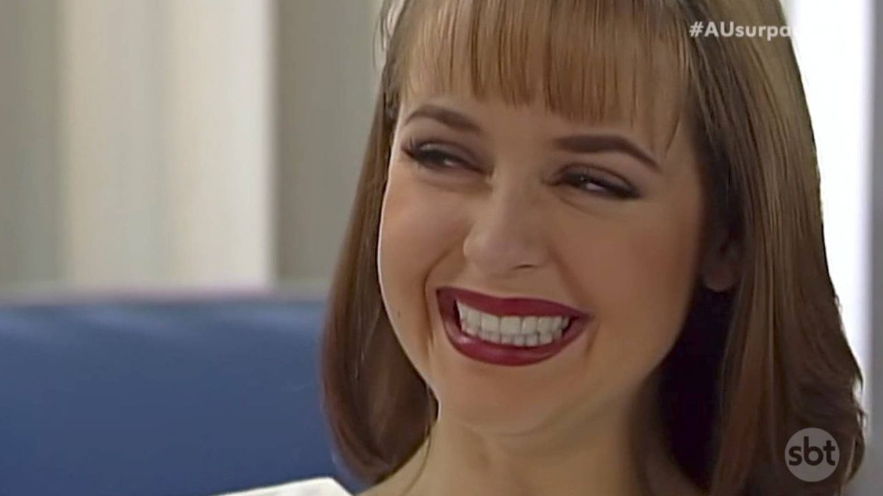 Paola ri em A Usurpadora